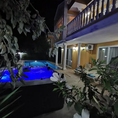 With A Pool And Jacuzzi Holiday home